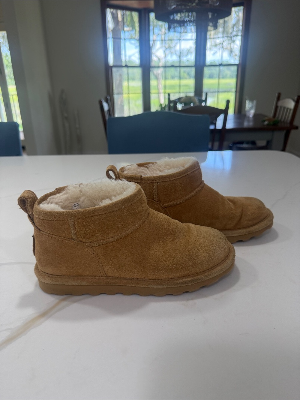 BearPaw women’s Chestnut Suede Shearling Slip-On Boots